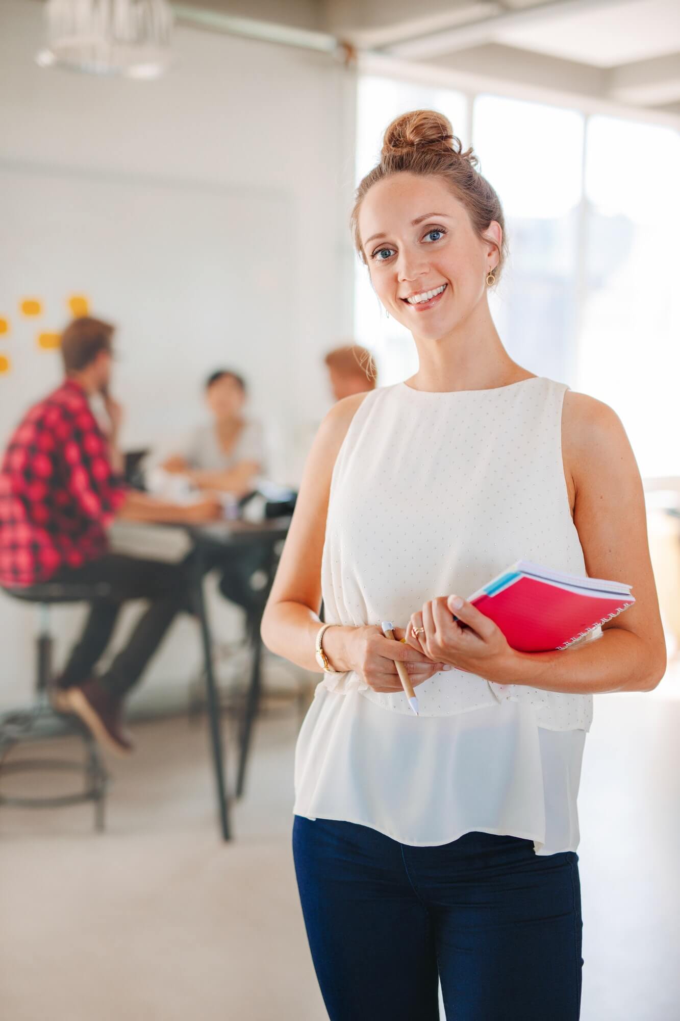 Happy Business Woman With Coworkers Meeting